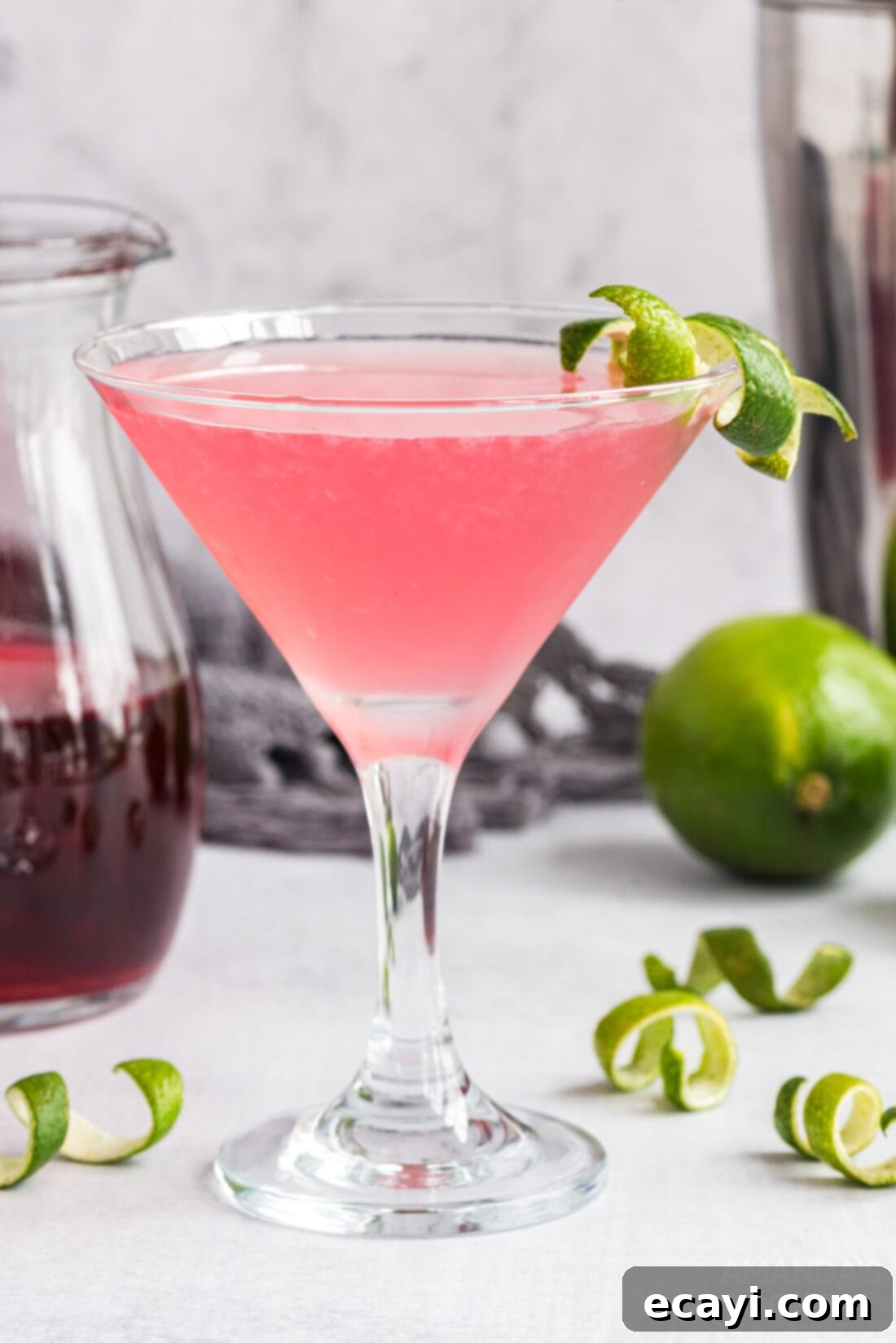 The Iconic Cosmopolitan Cocktail 7 Close-up of a vibrant pink Cosmopolitan cocktail in a martini glass, ready to be enjoyed