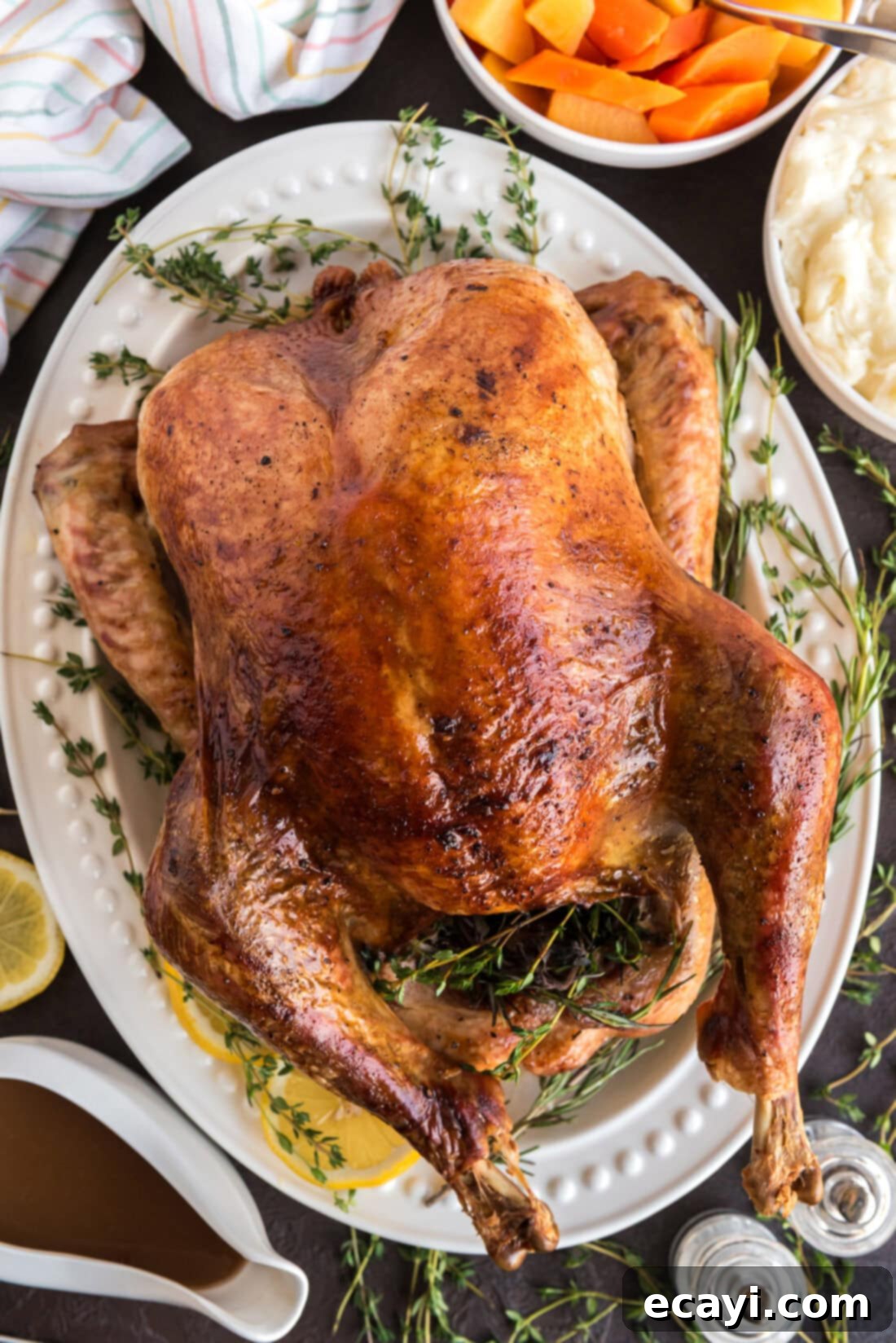 Golden Glazed Turkey 2 Roasted Turkey on a white serving platter