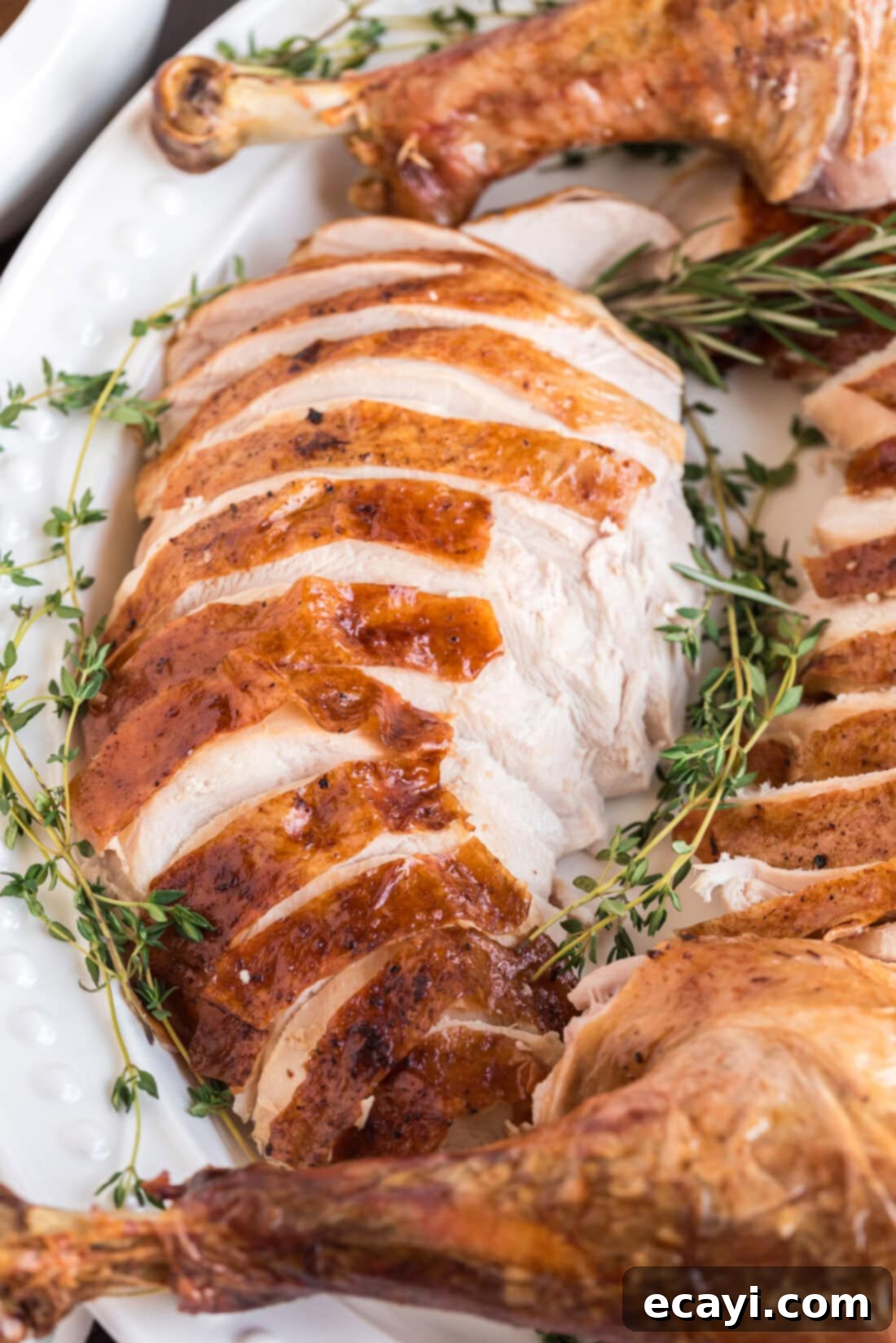 Golden Glazed Turkey 10 Close up photo of Roasted Turkey slices on a platter