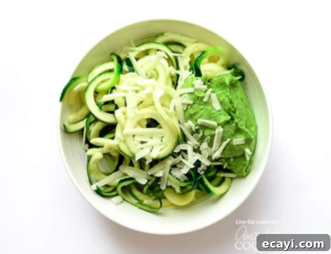 Zucchini noodles are a great low carb alternative to traditional pasta, and they’re so easy to make. Today we will show you how to make them at home! #zucchini #zucchininoodles #lowcarb #keto #lowcarbdinner #dinnerrecipes #vegetarian  Zucchini Noodles in bowl
