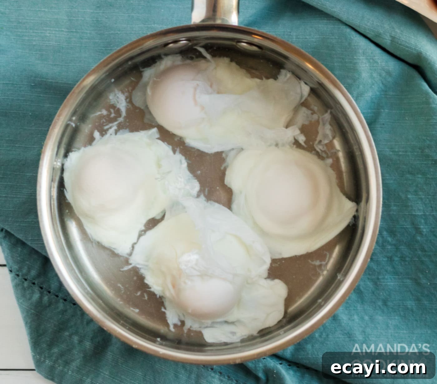 Golden Brunch Delight 5 poached eggs in pan