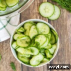 Refreshing Cucumber Salad 2 bowl of vinegar cucumber salad with dill garnish