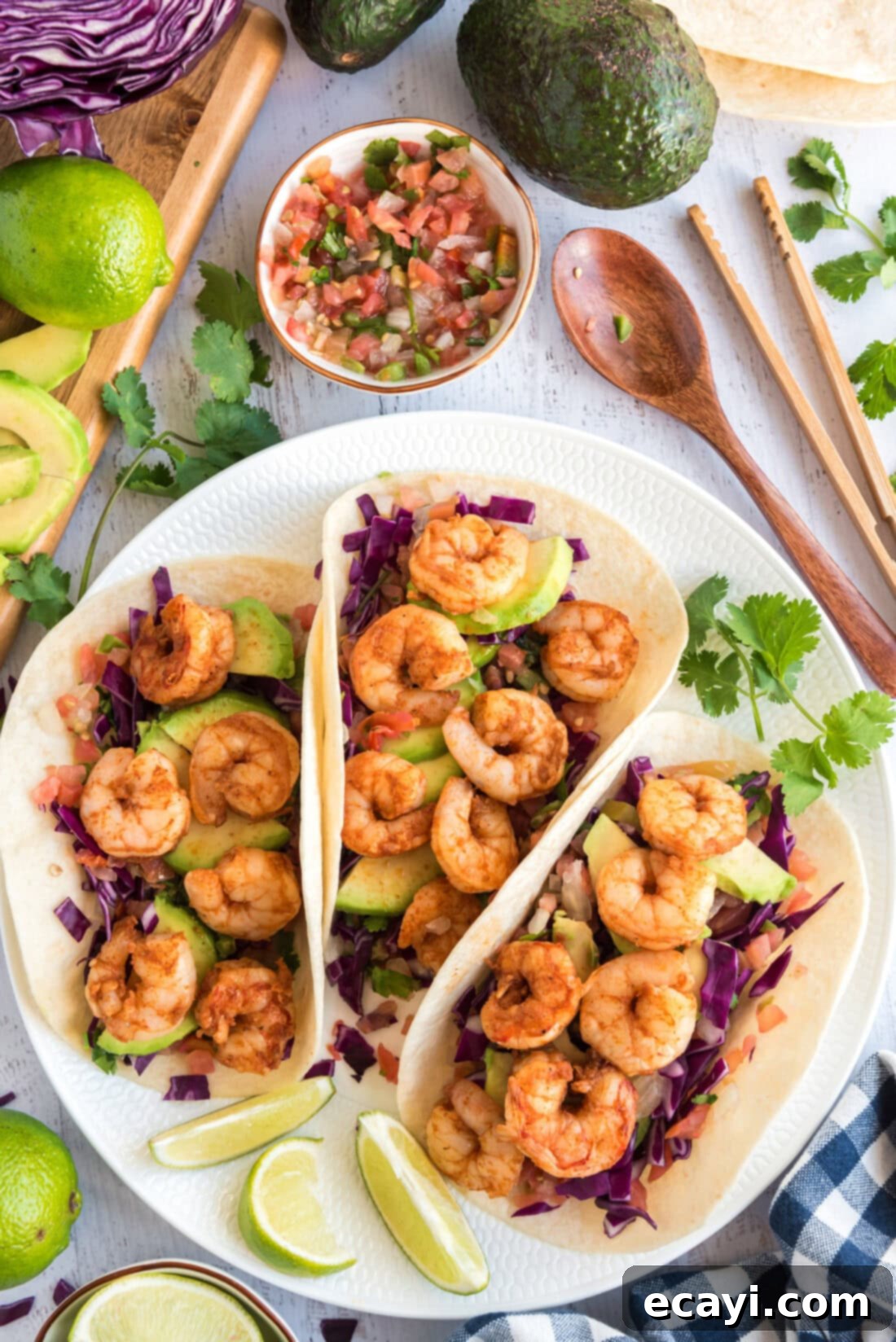 Zesty Shrimp Tacos 9 Three Shrimp Tacos on a white plate
