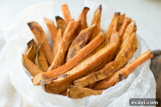Baked Sweet Potato Fries are a delicious side dish that are good for you! Baking beats frying for this tasty snack, reminiscent of the drive thru. Sweet Potato Fries