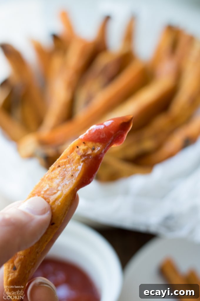 Baked Sweet Potato Fries are a delicious side dish that are good for you! Baking beats frying for this tasty snack, reminiscent of the drive thru. Fries with ketchup