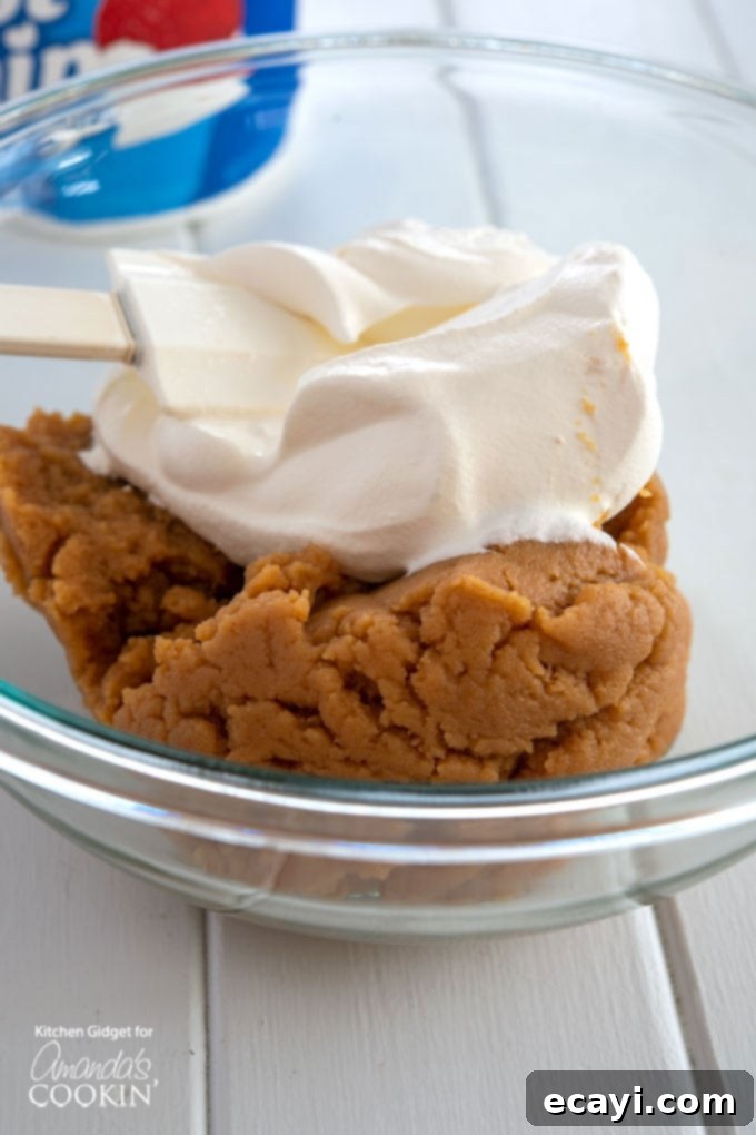 Effortless Peanut Butter Bliss 5 fold in cream cheese mixture