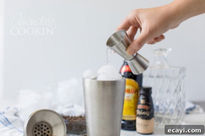 The Ground Gives Way 4 pouring vodka into cocktail shaker