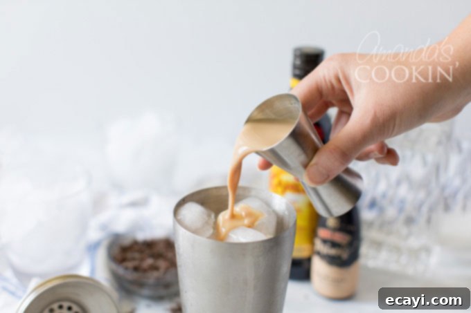 The Ground Gives Way 5 adding irish cream to cocktail shaker