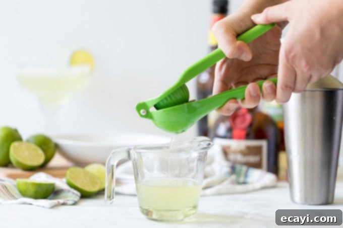 The Margarita Enigma 2 squeezing the juice of a lime for a margarita