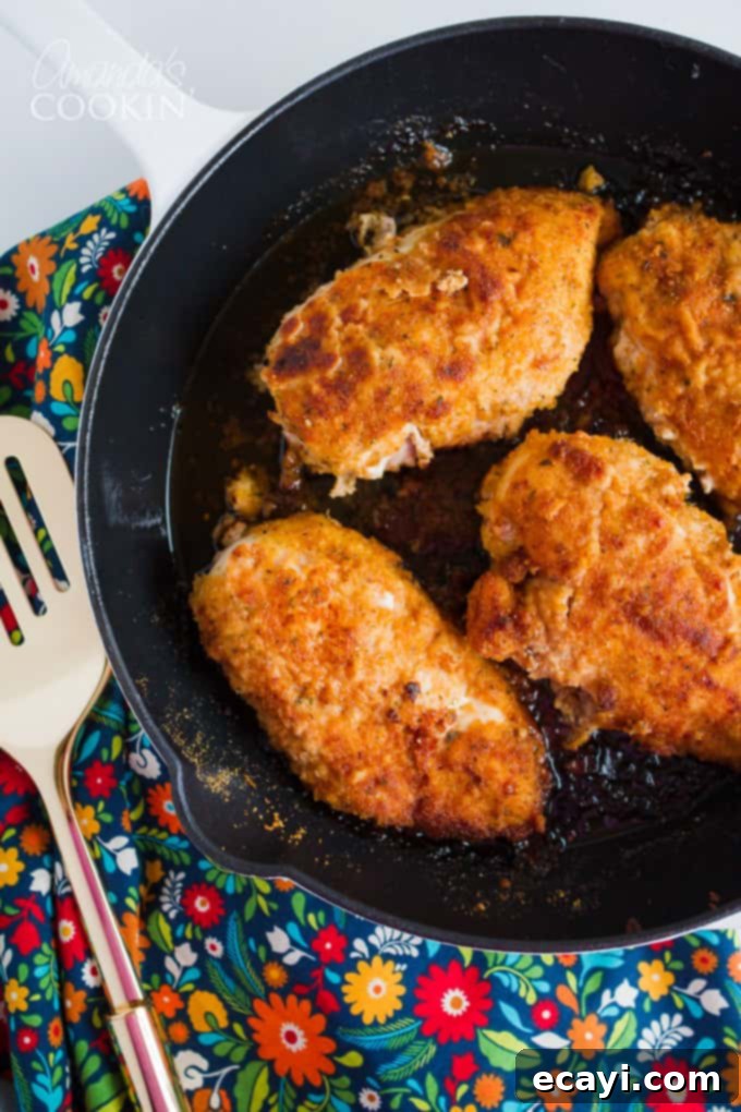 This spicy oven fried chicken gets its flavor from the spicy marinade. Be sure to marinate the chicken the suggested amount of time for perfect results! Oven fried chicken in a skillet