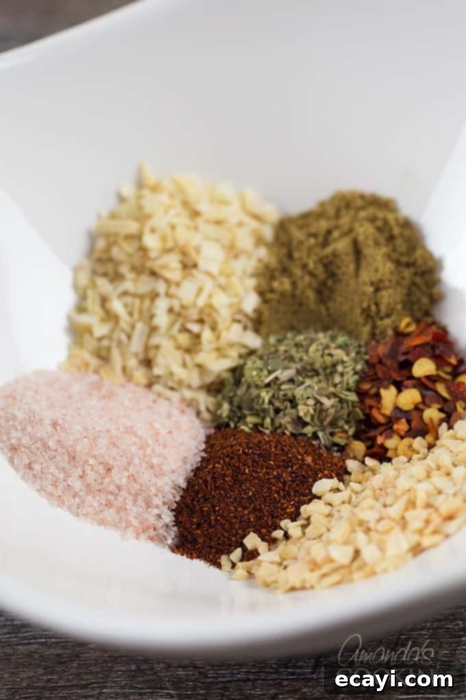 Gather your fresh spices to create the most flavorful homemade taco seasoning mix you've ever tasted. Various individual spices for homemade taco seasoning neatly arranged in small bowls before mixing