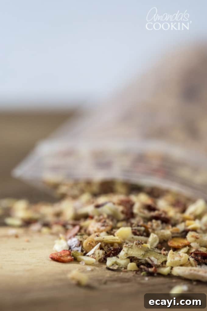 Feast your eyes on this perfectly blended homemade taco seasoning, guaranteed to elevate your next taco night. Close-up view of freshly mixed homemade taco seasoning, showing the blend of vibrant spices
