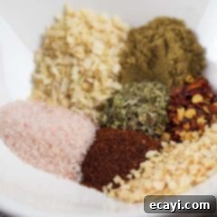 Custom Taco Spice Blend 2 A mix of colorful spices, including chili powder, cumin, and oregano, for homemade taco seasoning
