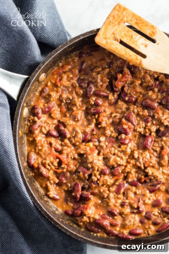 Classic Homemade Chili 9 A large skillet brimming with homemade chili, ready for serving