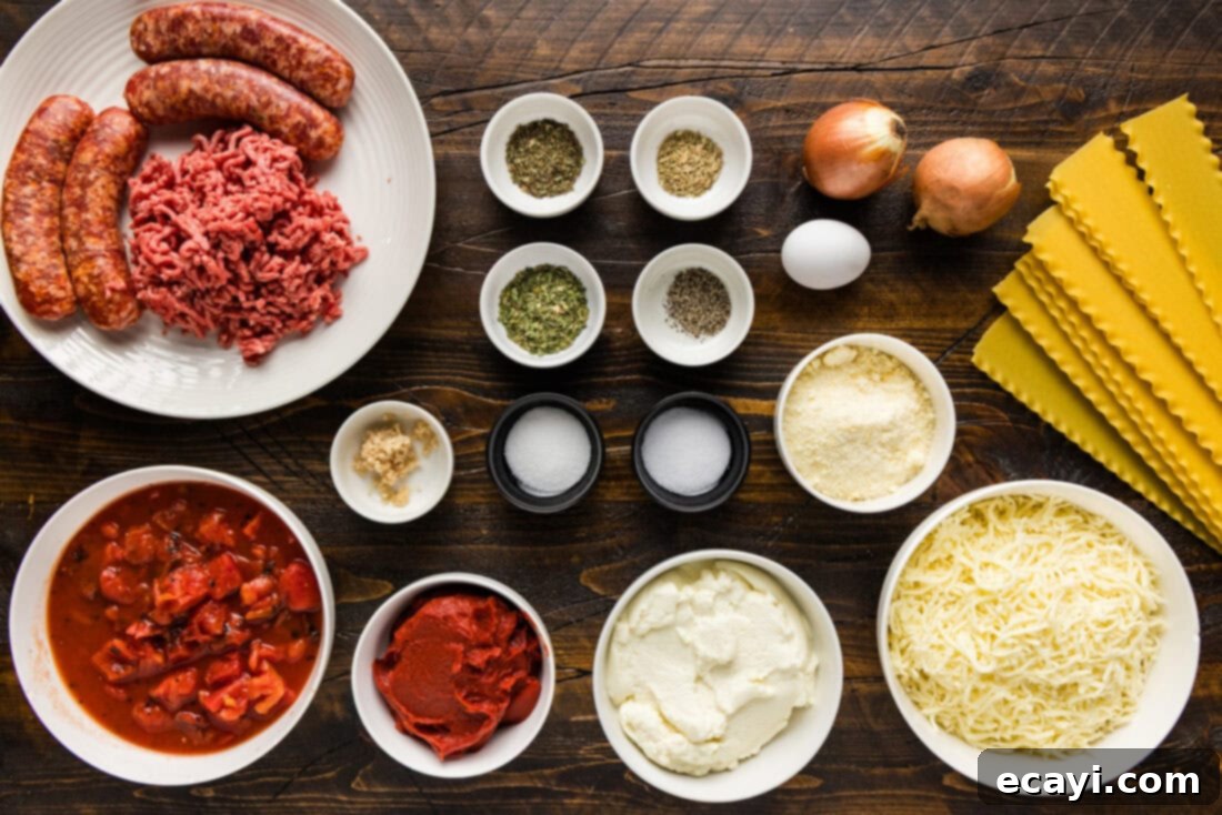 Classic Italian Lasagna 5 An organized display of fresh ingredients for Italian Lasagna including ground meats, various cheeses, tomatoes, onions, garlic, and lasagna noodles.