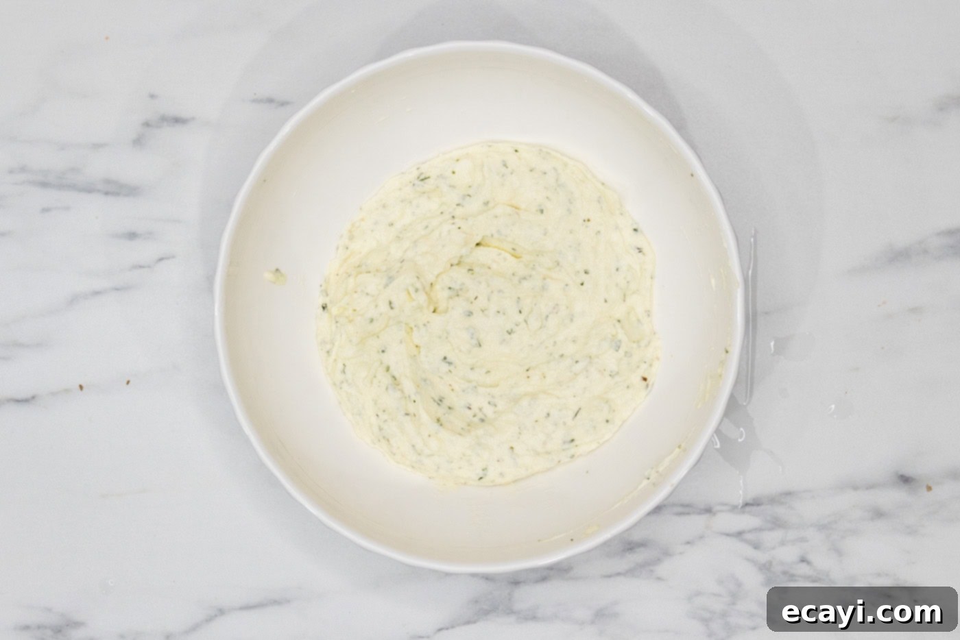 Classic Italian Lasagna 8 Creamy ricotta cheese mixture, perfectly blended with egg, parsley, and salt, ready to be layered into the lasagna.