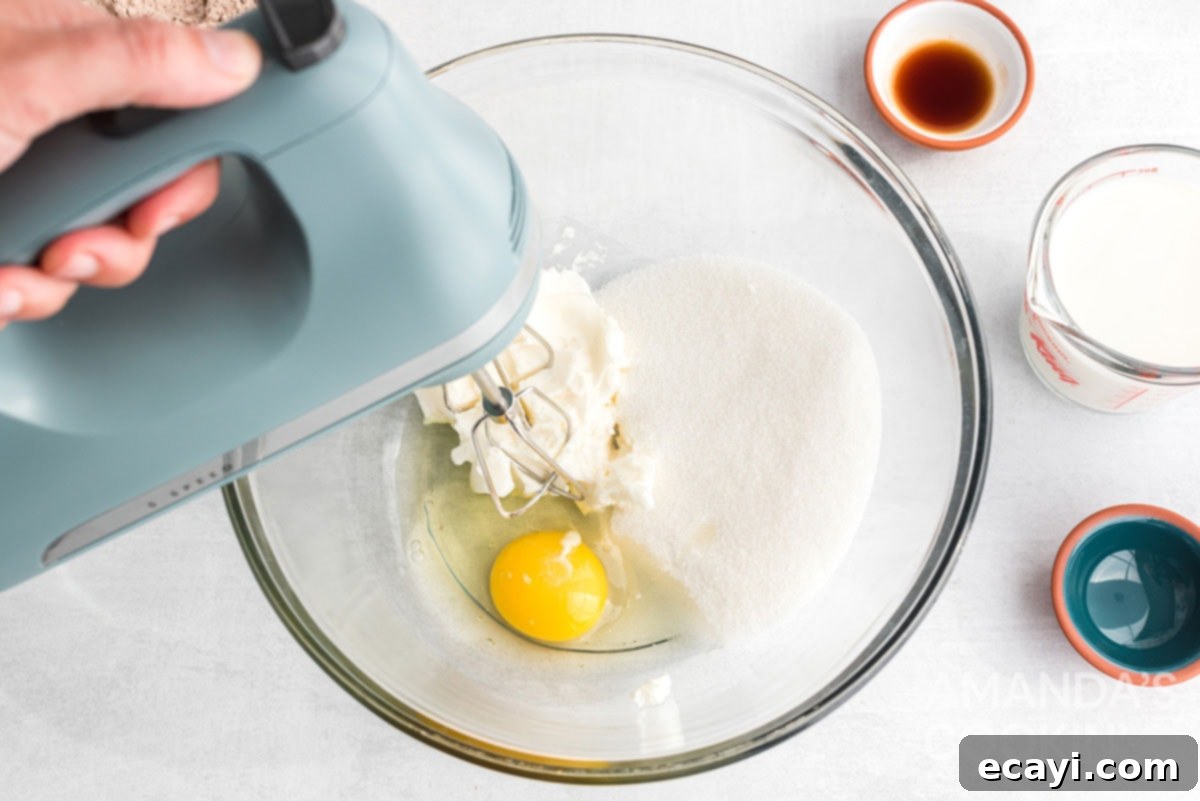 Pumpkin Spice Whoopie Bites 4 mixing egg with sugar and shortening in a stand mixer bowl