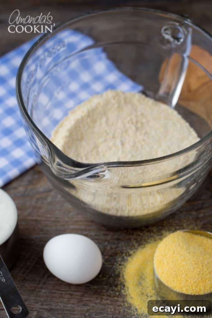 Honey-Kissed Cornbread 4 Sweet cornbread batter being mixed in a bowl, showcasing the combined ingredients