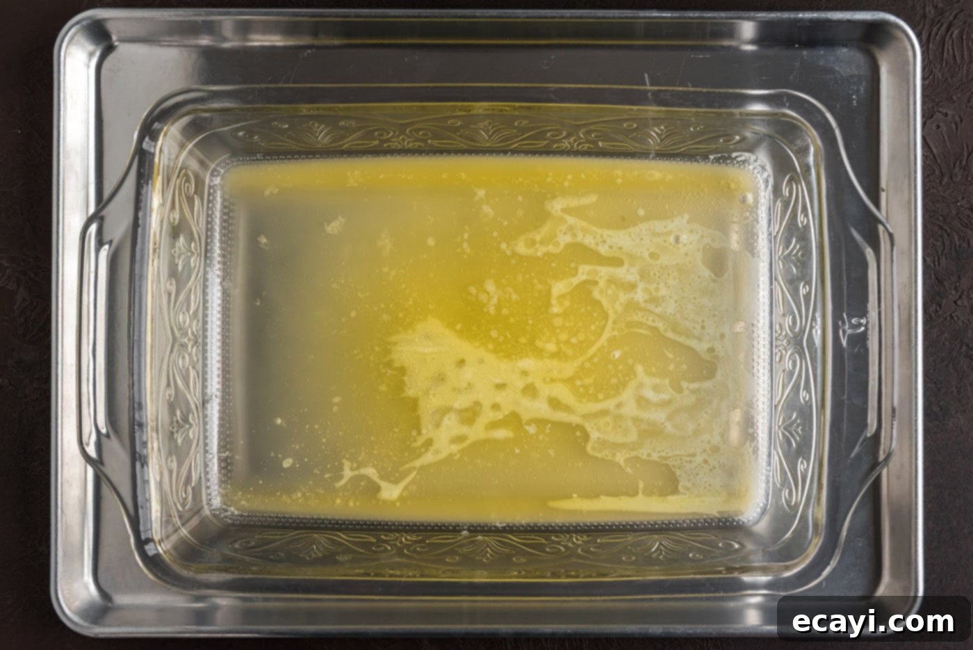 Ruby Raspberry Reveal 8 melted butter in baking dish