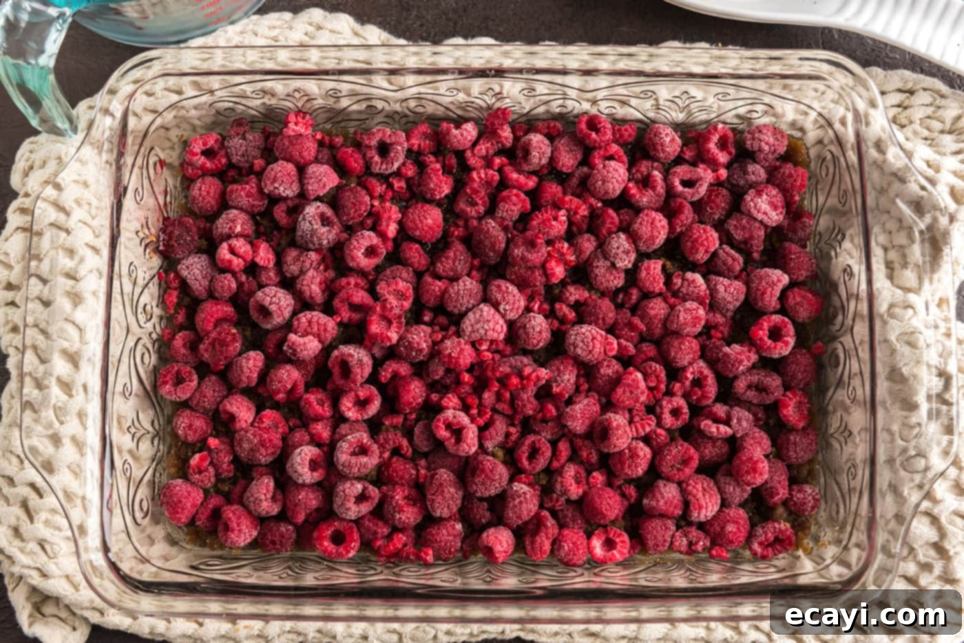 Ruby Raspberry Reveal 10 raspberries on top of brown sugar butter mix