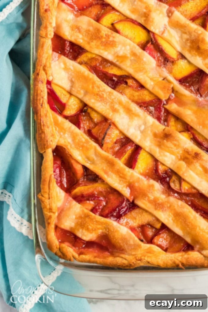 Heavenly Deep Dish Peach Pie 5 overhead close up view of the bubbling, golden-brown deep dish peach pie straight from the oven
