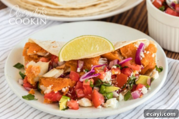 Your New Favorite Fish Tacos 11 fish taco with all toppings beautifully presented on a plate