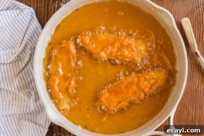 Your New Favorite Fish Tacos 9 fish frying in hot oil, turning golden brown