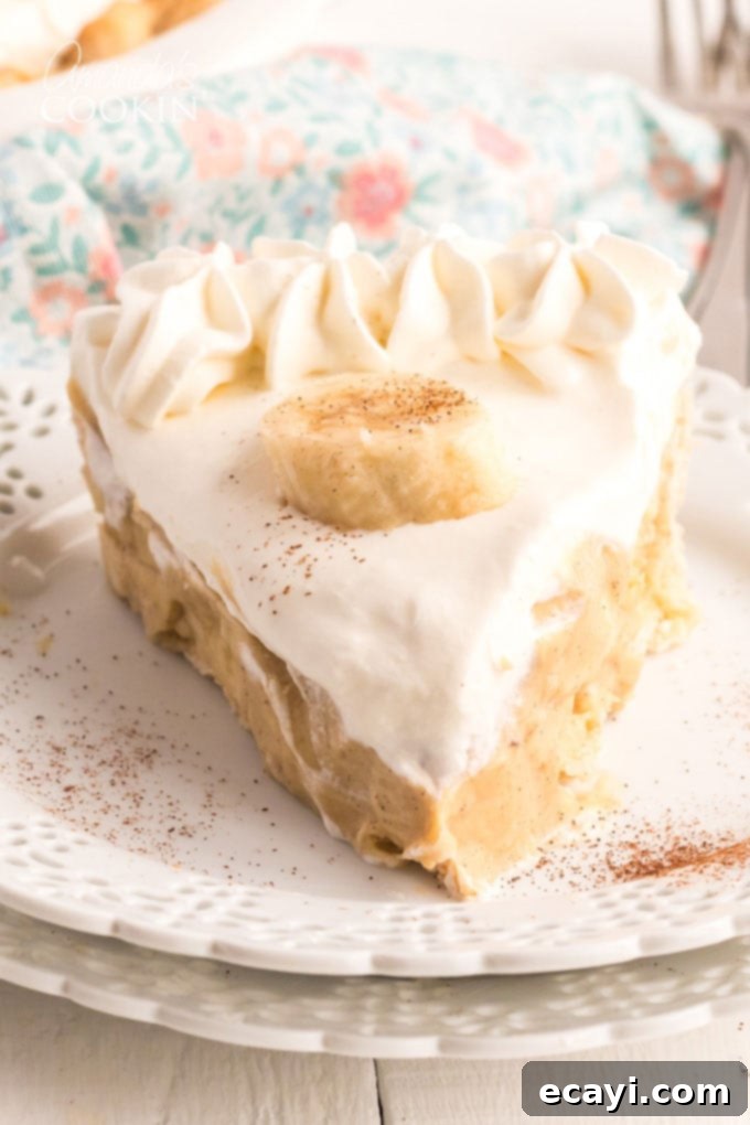 Golden Banana Indulgence 2 slice of banana cream pie on a white plate