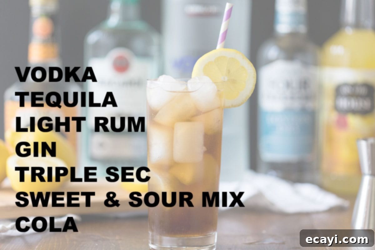 No Tea, All Buzz 3 A flat lay photograph showcasing all the ingredients required to make a Long Island Iced Tea: bottles of vodka, tequila, light rum, gin, triple sec, a measuring jigger, a bottle of sweet and sour mix, cola, and fresh lemons.