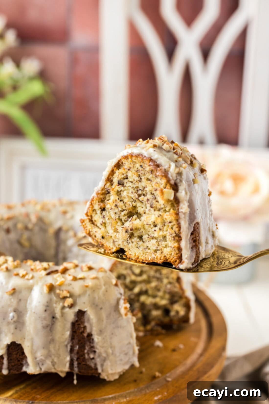 Velvet Banana Bundt 3 Slice of Banana Bundt Cake being served on a pie server
