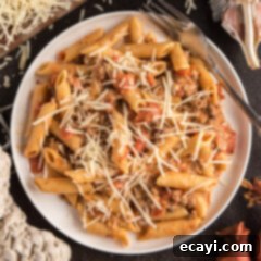 Tomato Sage Sausage Penne 14 Close up photo of Penne with Tomato Sage Sausage Sauce on a plate