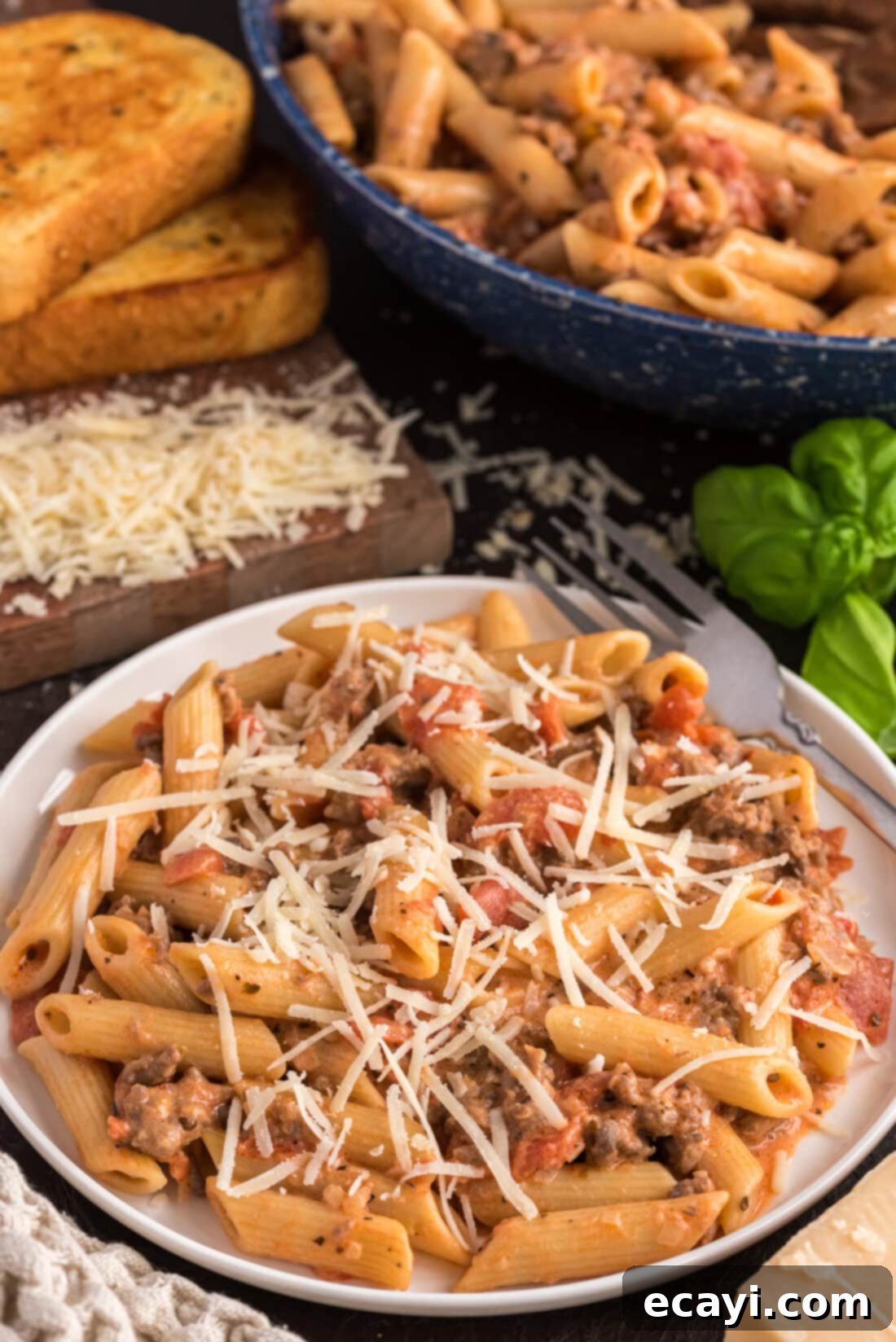 Tomato Sage Sausage Penne 3 Plate of Penne with Tomato Sage Sausage Sauce topped with Parmesan cheese and fresh herbs