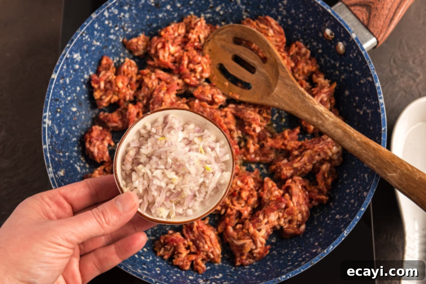 Tomato Sage Sausage Penne 6 adding shallots to pan with ground pork sausage and garlic