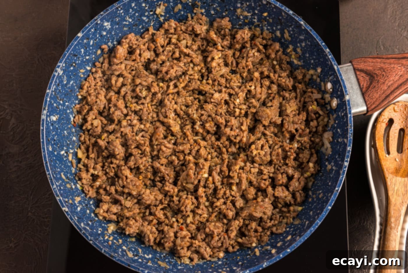 Tomato Sage Sausage Penne 7 cooked ground pork sausage in a skillet with shallots and garlic