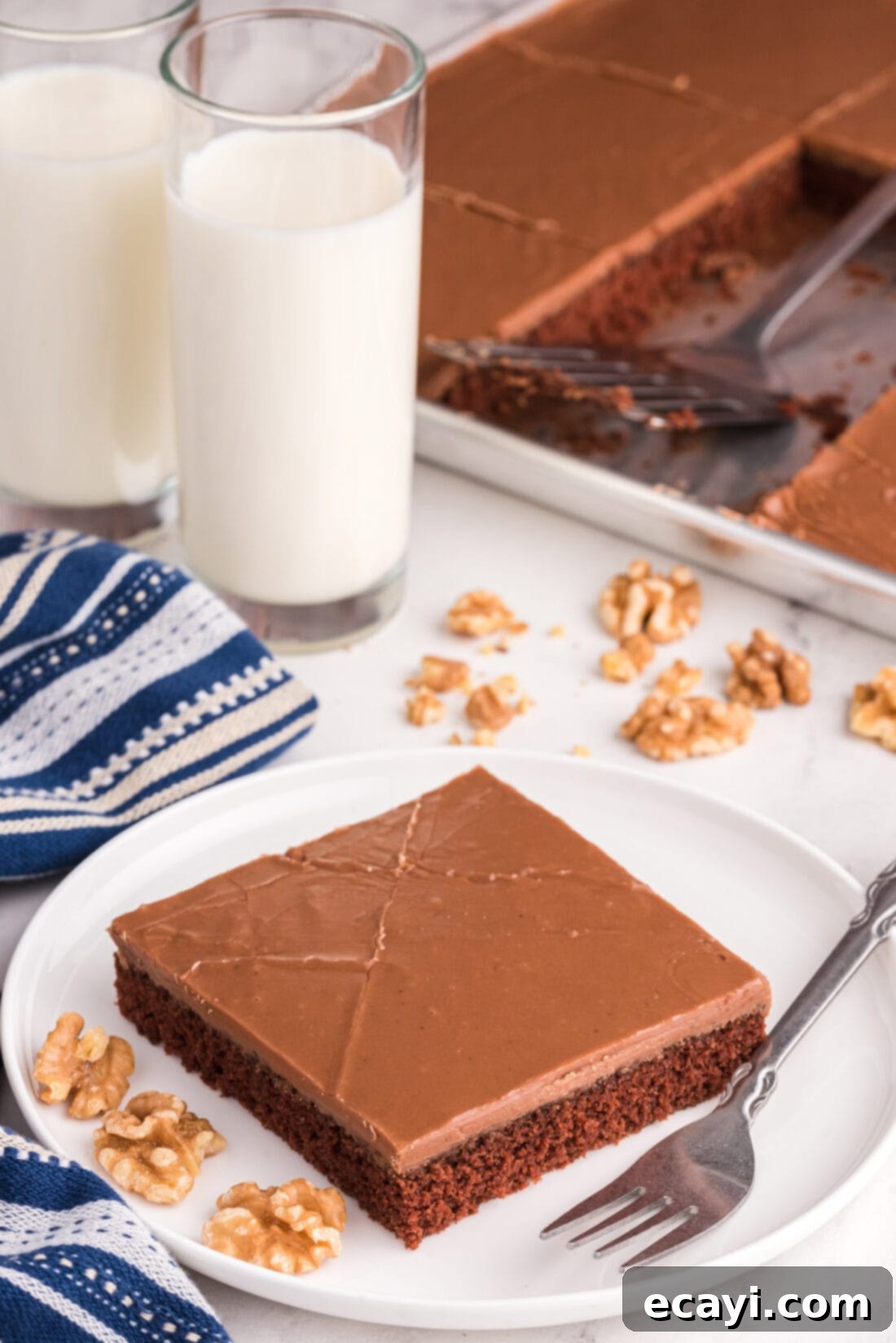 Texas-Sized Chocolate Dream 3 slice of Chocolate Texas Sheet Cake with glasses of milk
