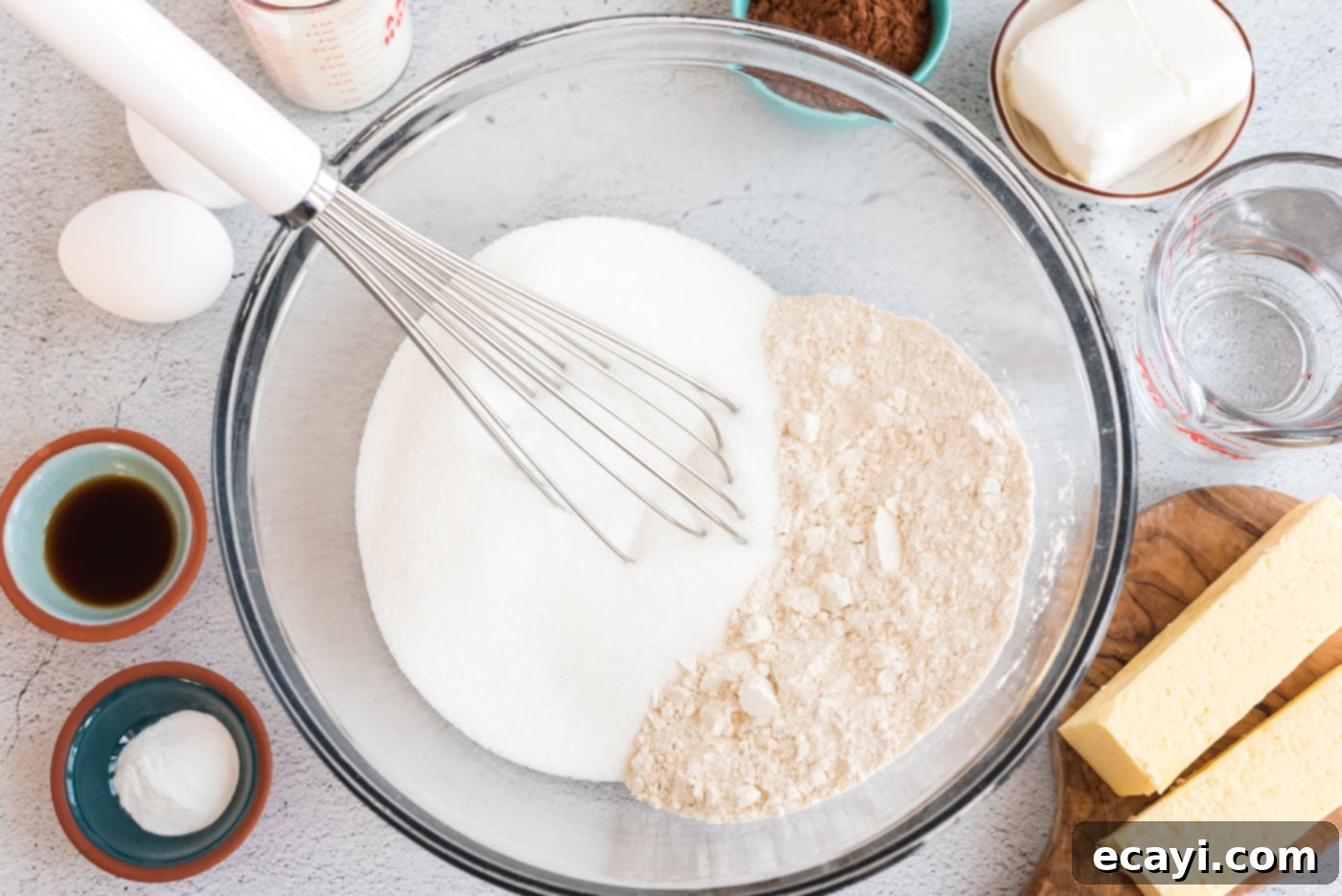 Texas-Sized Chocolate Dream 5 flour and sugar in a bowl with a whisk