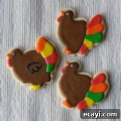 A Harvest of Sweet Thanksgiving Cookies 2 A photo of three thanksgiving turkey cookies.