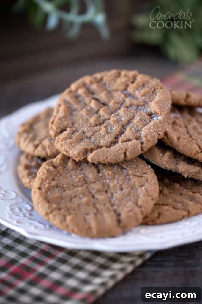 Decadent Nutella Peanut Butter Cookies 4 A beautifully arranged stack of Nutella Peanut Butter Cookies on a plate, highlighting their inviting appearance and soft centers.