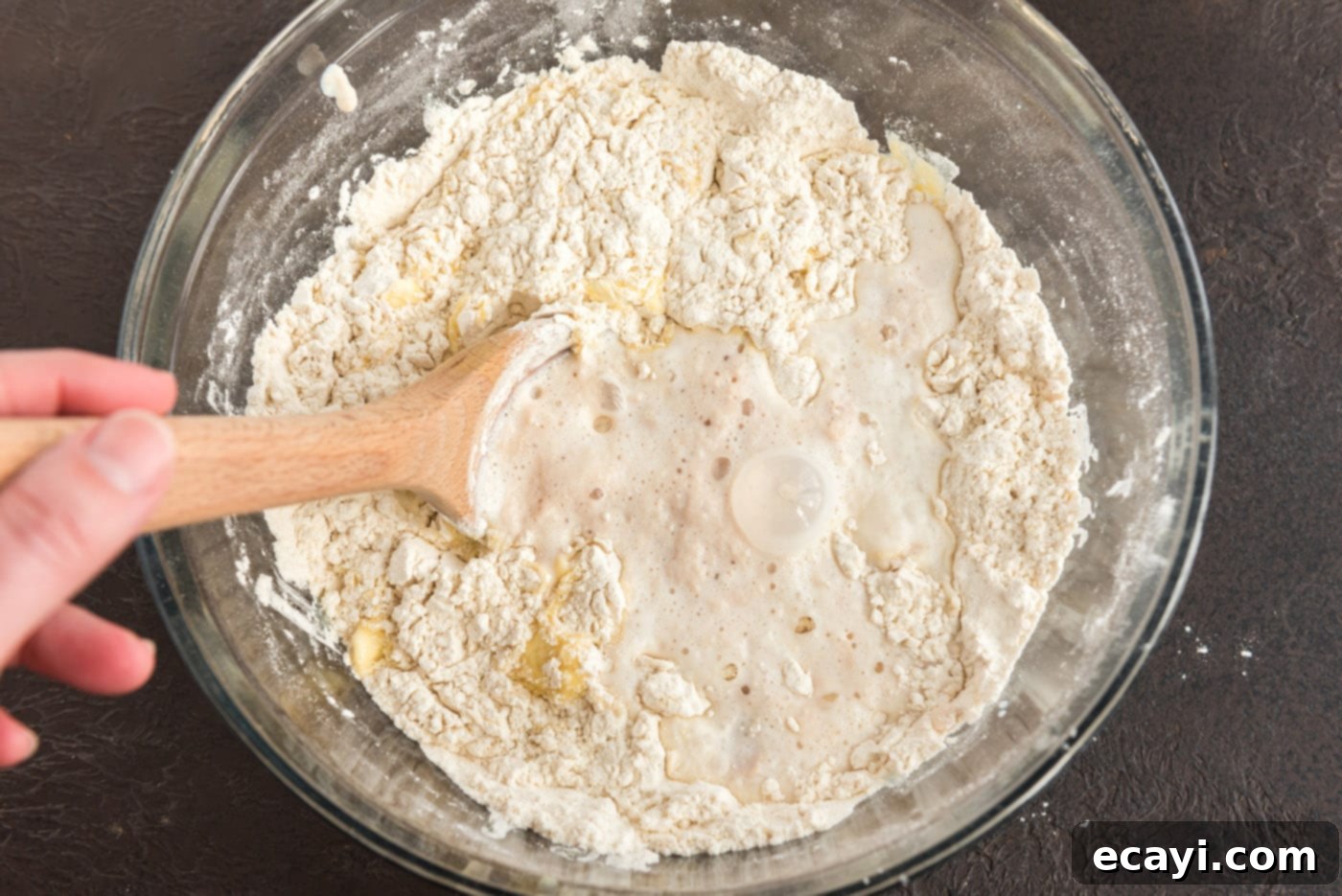 Hearty German Party Loaf 11 stirring flour with yeast and butter mixture