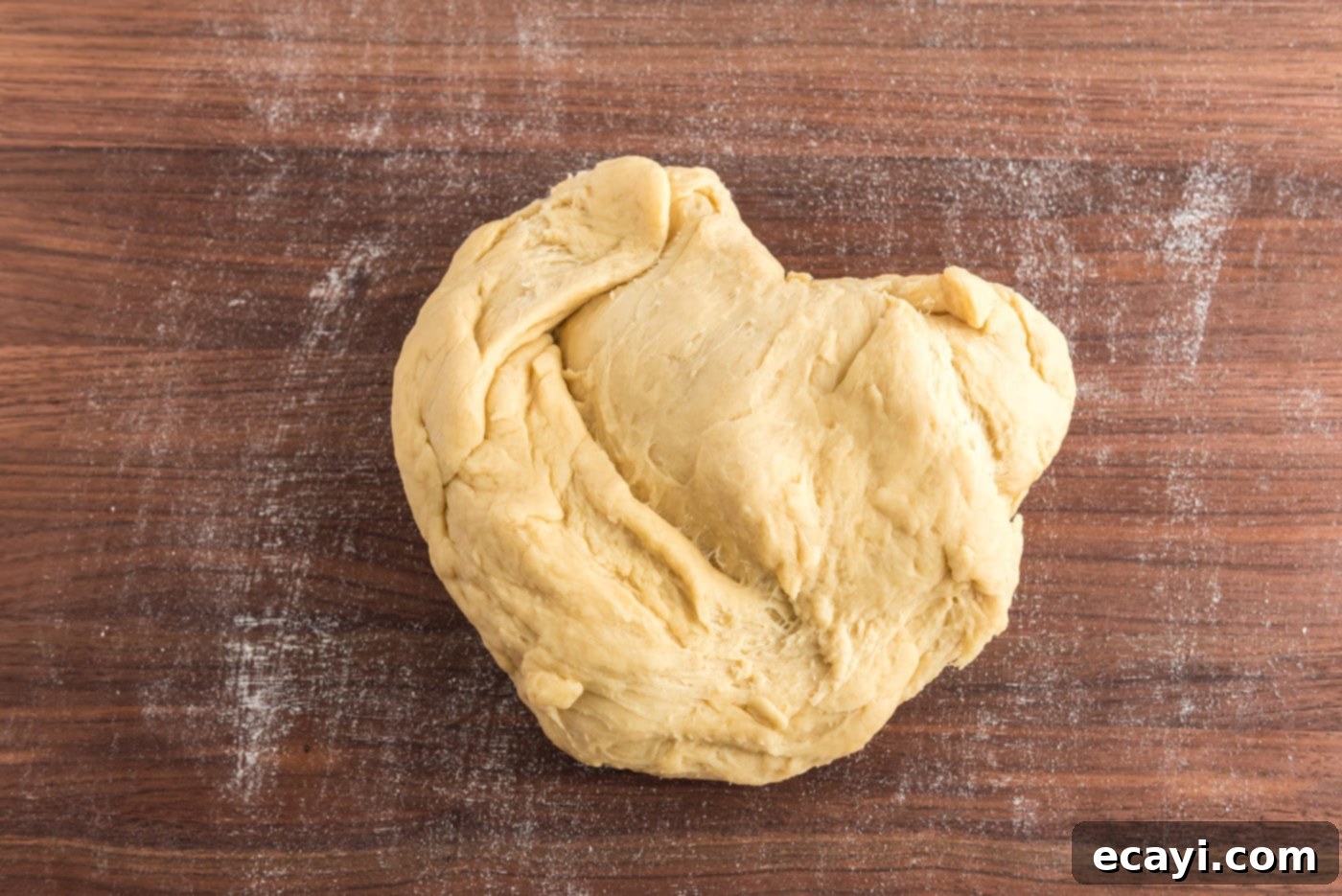 Hearty German Party Loaf 13 kneading yeast dough on cutting board