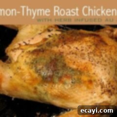 Succulent Lemon-Thyme Roast Chicken with Pan Jus 2 A close up photo of a lemon thyme roast chicken with jus.