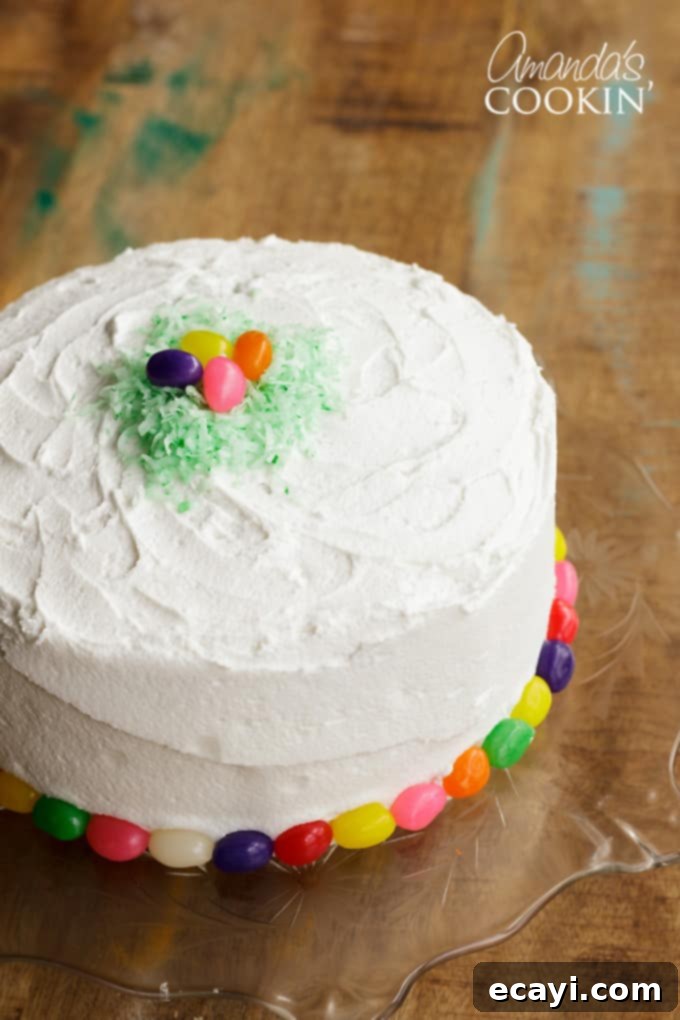This Checkerboard Cake is the perfect treat for Easter- impress your friends and family with a colorful cake for the holiday! #easter #easterdessert #easterrecipes #cake #checkerboardcake #cakerecipes #cutefood #frosting Delicious and soft checkerboard cake for Easter!