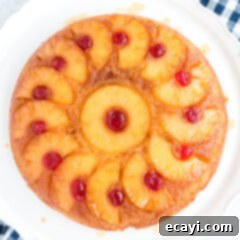 Golden Skillet Pineapple Flip 13 pineapple upside down cake on a white plate