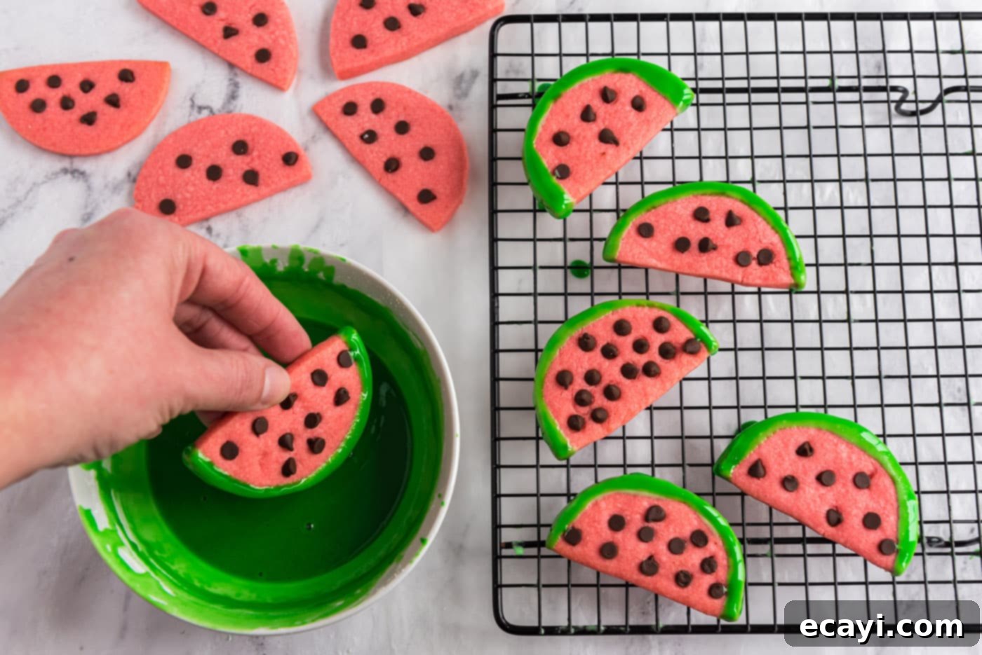 Melon Patch Morsels 14 dipping watermelon slice cookies in green glaze