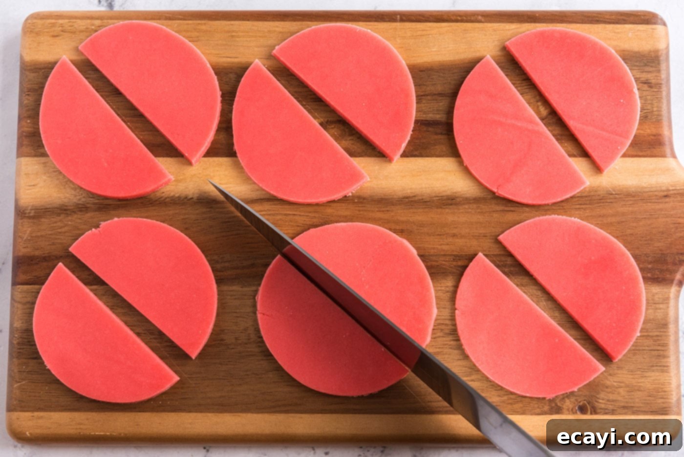 Melon Patch Morsels 10 slicing sugar cookie dough discs in half