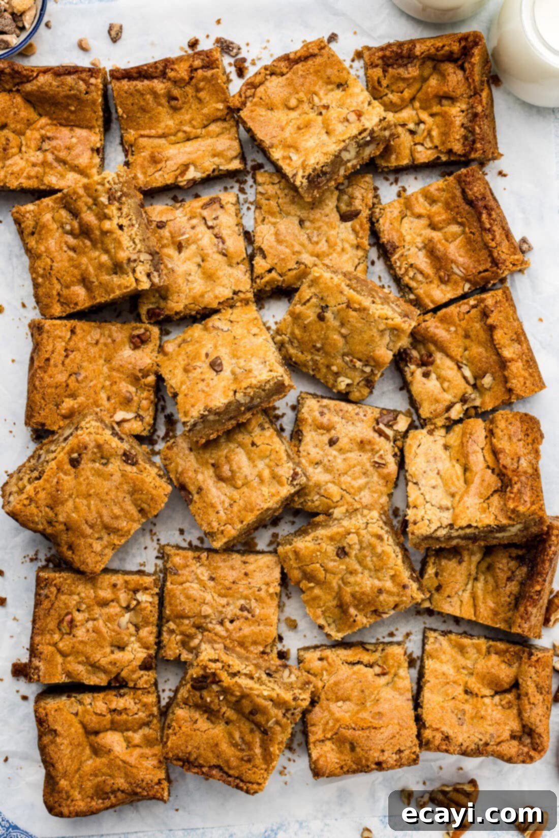 Golden Brown Butter Toffee Bars 3 Brown Butter Chocolate Toffee Blondies cut up on parchment paper