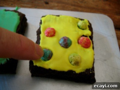 The Brownie Behemoth 12 Gently press Trix and Cocoa Puffs cereals into the frosted brownies
