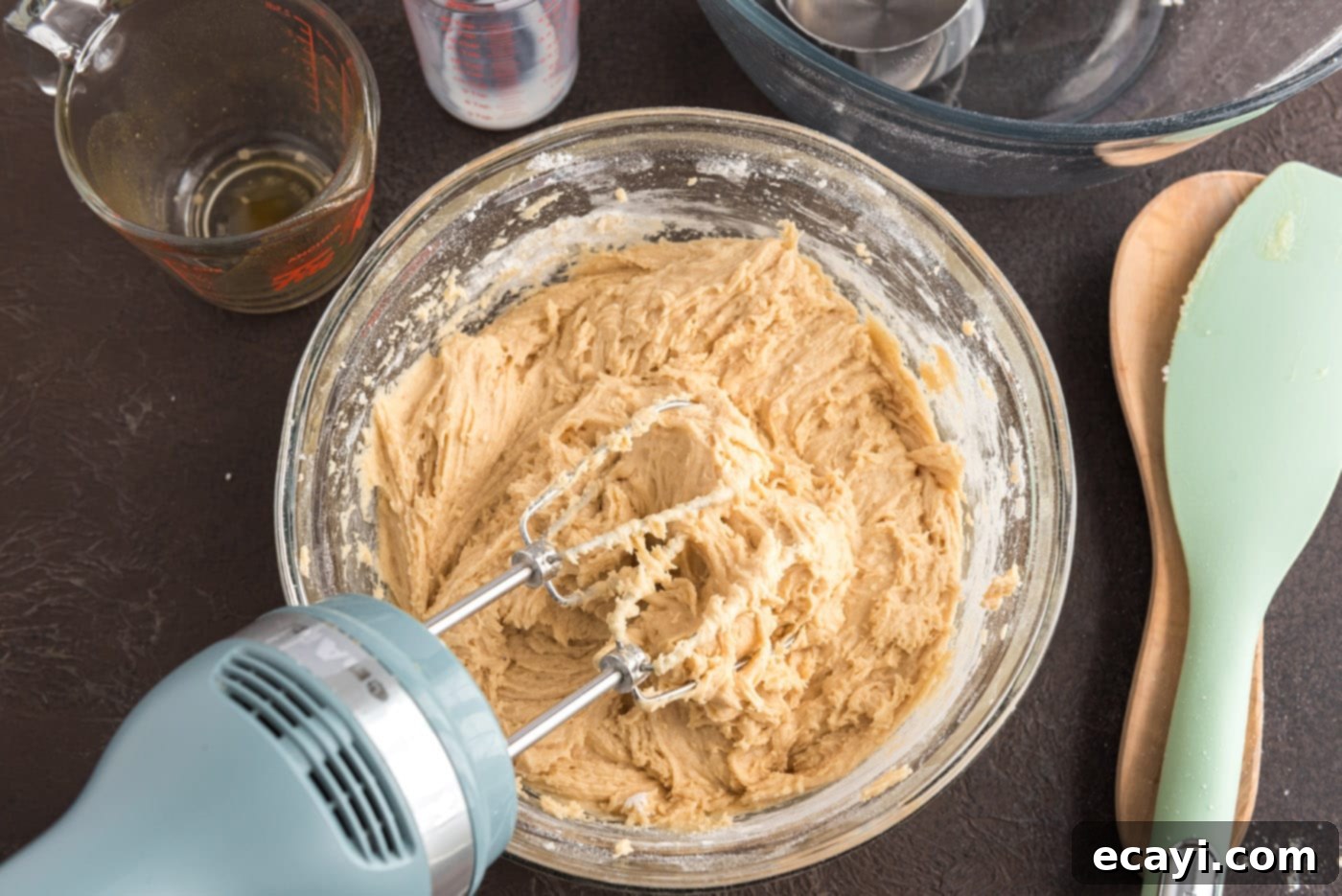 Apple Cider Doughnuts 14 mixing apple cider doughnuts batter with an electric mixer until just combined