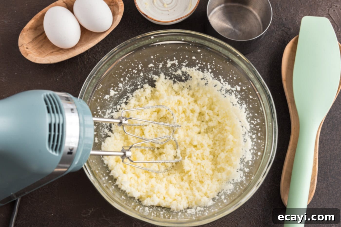 Apple Cider Doughnuts 7 mixer beating butter in a bowl until light and fluffy