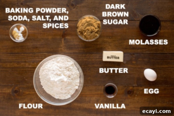 Essential Ingredients for Gingerbread Cookies A vibrant selection of ingredients laid out, including flour, spices, butter, eggs, and molasses, for making homemade gingerbread cookies.